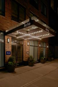 
a large building with a sign on the side of it at Arlo SoHo in New York

