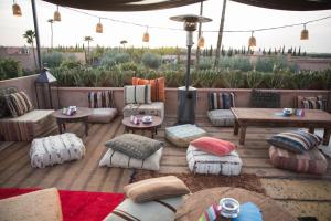 Coin salon dans l'établissement The Source Hotel Music & Spa
