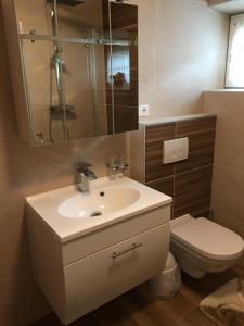 Koupelna v ubytování Musi Appartements