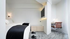 Letto o letti in una camera di Swiio Hotel Daan