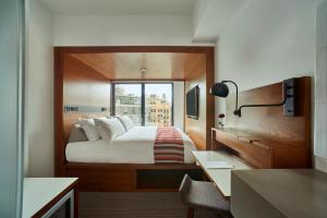 Cama ou camas em um quarto em Arlo SoHo