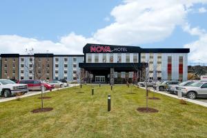 a building with a sign that reads nova hotel at Chateau Nova Yellowknife in Yellowknife