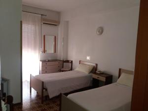 Postel nebo postele na pokoji v ubytování Albergo Europa