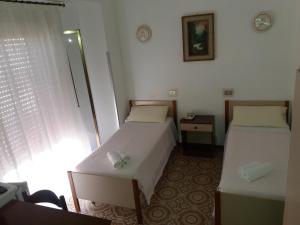 Postel nebo postele na pokoji v ubytování Albergo Europa