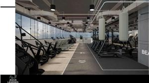 a gym with rows of treadmills and machines at Flow Aqua Legends Resort Sahl Hasheesh in Hurghada