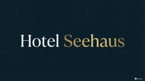 a sign with the words hotel seattle in gold at Hotel Seehaus in Cuxhaven