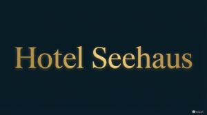 a sign that reads hotel seattle in gold at Hotel Seehaus in Cuxhaven