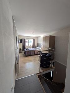 a view of a bedroom with a bed in a room at Hehlentor in Celle
