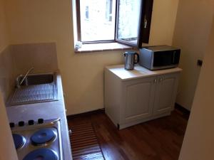 Kuchyňa alebo kuchynka v ubytovaní Castello Izzalini Todi Resort