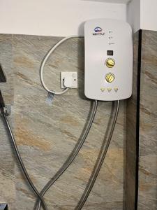 a electrical outlet with a cord plugged into it at Villa Amore in Ahangama
