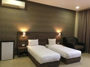 Letto o letti in una camera di Primer Hotel