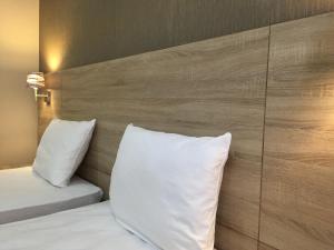 Letto o letti in una camera di Primer Hotel