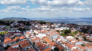an aerial view of a city with buildings at Flat com quarto e sala in Viçosa do Ceará
