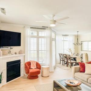 a living room with a couch and a fireplace at Spacious Private 2BR-2BA I Pool I Garage I Central in Rehoboth Beach +27 photos