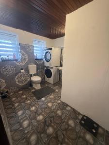 a bathroom with a toilet in a room at Lina Ferienhaus in Longkamp +38 photos