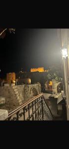 a view of a city from a balcony at boutique hotel FASHI NIK in Rhodes Town +2 photos