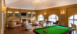 a living room with a pool table at Jacob Harmony in Jerusalem