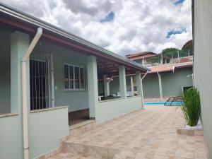 a view of a house with a patio at Casas Bela Vista 1 - 2 in Águas de Lindoia