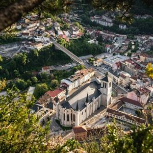 an aerial view of a city with a large building at L azur Jurassien séjour chaleureux dans le Jura in Saint-Claude