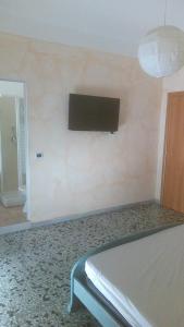 TV a/nebo společenská místnost v ubytování Bed And Breakfast Il Subacqueo