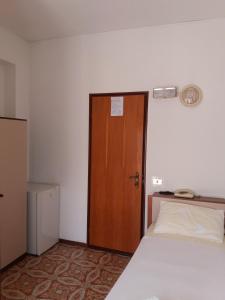 Postel nebo postele na pokoji v ubytování Albergo Europa