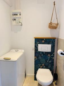 a small bathroom with a toilet and a sink at Studio Moderne Cozy in Ribaute-les-Tavernes +17 photos