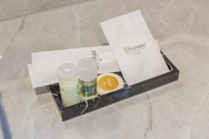 a box of makeup products sitting on top of a table at Aqua Soul de Pakbara in Ban Pak Ba Ra