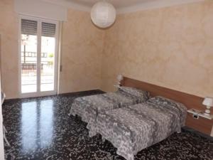 Postel nebo postele na pokoji v ubytování Bed And Breakfast Il Subacqueo