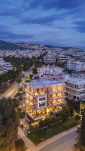 an aerial view of a building with a city at Minavra Hotel in Athens