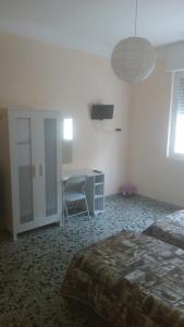 Postel nebo postele na pokoji v ubytování Bed And Breakfast Il Subacqueo