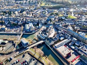 an aerial view of a city with a harbor at The Sandbed Retreat in Hawick
