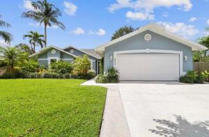 a house with a garage in a yard at Florida house, 4br 2bt with private pool oasis in Naples
