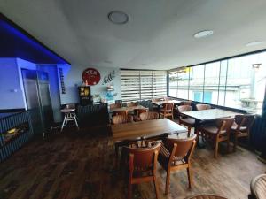 a restaurant with tables and chairs in a room at Leyenda Boutıque Hotel in Istanbul