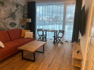 Et sittehjørne på Apartament dębowy