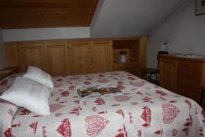 A bed or beds in a room at Chalet Stelvio