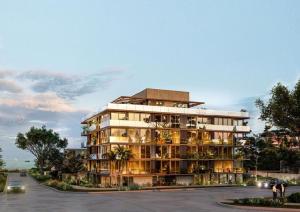 a large building with a lot of balconies at Sea Side2 in Piriápolis +10 photos