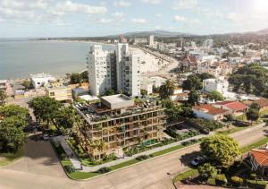 an aerial view of a city and the ocean at Sea Side2 in Piriápolis