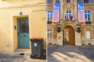 a building with a green door and a trash can at Château Walk Studio Appartement in Fontainebleau