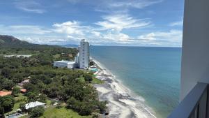 an aerial view of a building next to the ocean at Gorgona playa in Nueva Gorgona