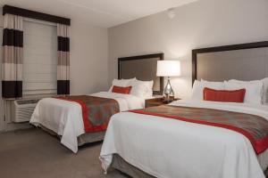 Postel nebo postele na pokoji v ubytování Ramada by Wyndham Boston
