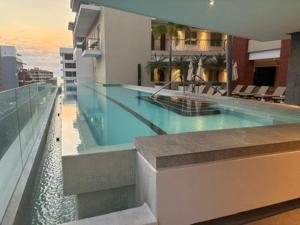 a swimming pool on the side of a building at Pavilion 307 in Puerto Vallarta