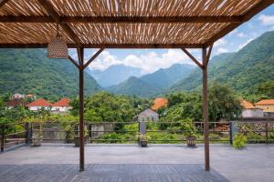 a view of the mountains from a pavilion at Villa Jati Private Pool - Amed in Amed