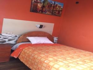 Postel nebo postele na pokoji v ubytování Hospedaje K'uchuwasi + 15 fotografií