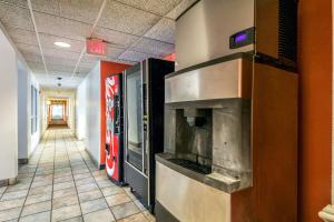a hallway of a fast food restaurant with a pizza oven at Motel 6 New Braunfels in New Braunfels