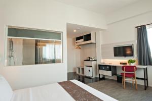 Kuchyň nebo kuchyňský kout v ubytování Hotel Arissa