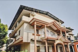 an image of a building with a fire escape at RAIAl DWELLING PLACE in Calangute +2 photos