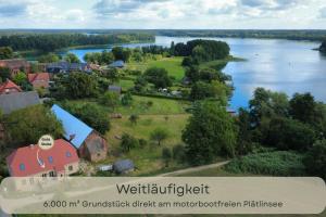 an aerial view of a town and a river at Hufe 9 Gute Stube - Digital Detox und Entschleunigen oder Aktiv-Urlaub in der Natur - Bauernhof Charme trifft modernes Design in Wustrow