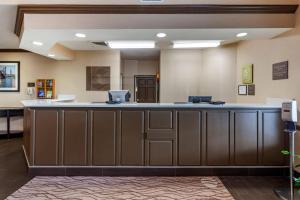 a large lobby with a bar in a hospital at Comfort Inn & Suites Geneva- West Chicago in Geneva +63 photos