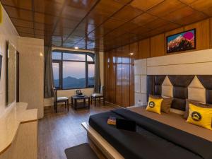 a bedroom with a large bed in a room at The Hosteller Shimla in Shimla
