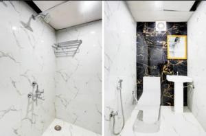a white bathroom with a shower and a sink at RROOMS Eco Hotel Blue Stone- Near Singapore Mall And Max Hospital in Lucknow +6 photos